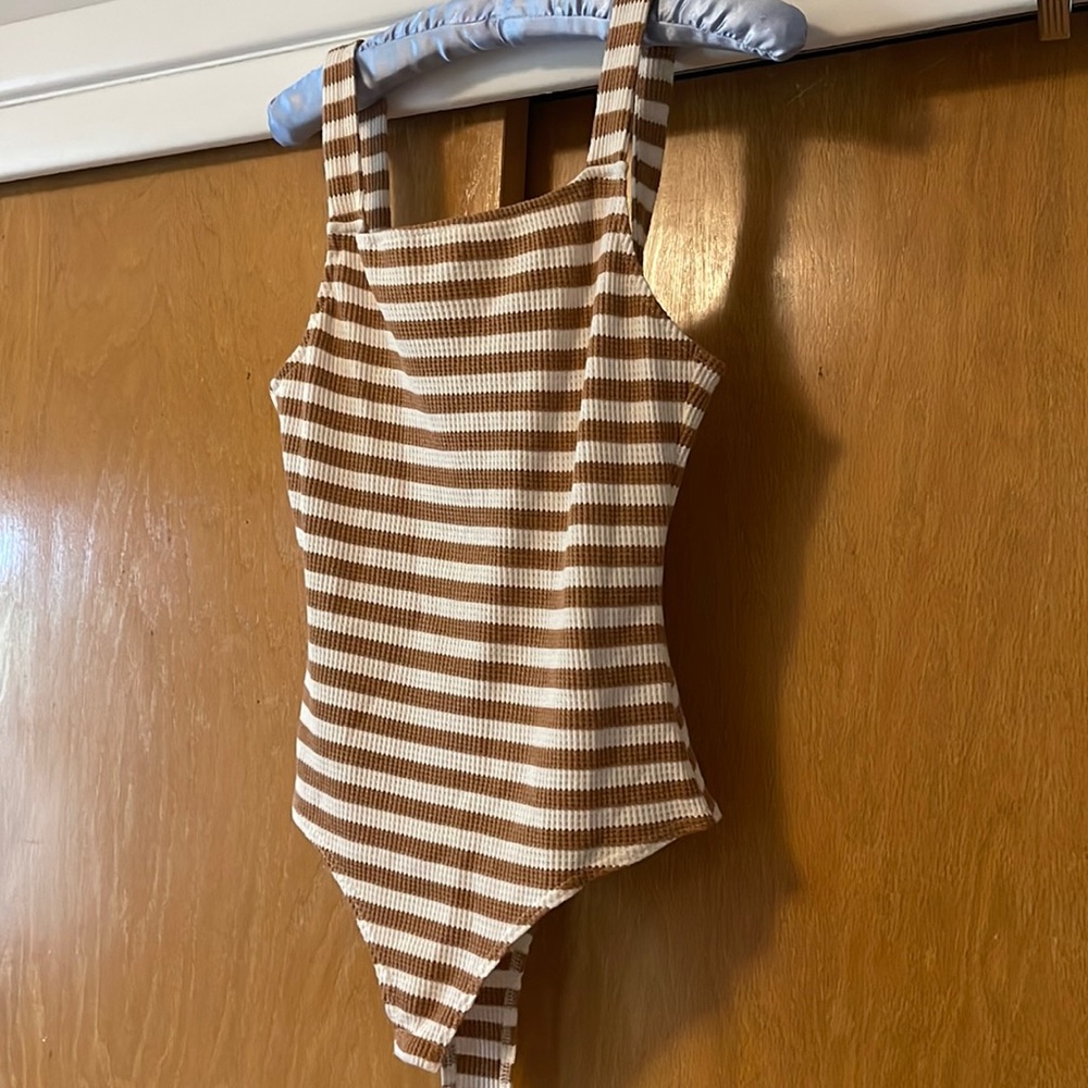 Pink lily body suit
